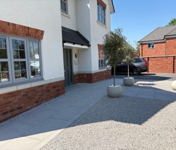 Porcelain tiles and gravel driveway